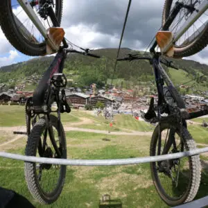 Les Gets summer 2025 lift pass price chart for adults, children, and families, with daily and weekly options.