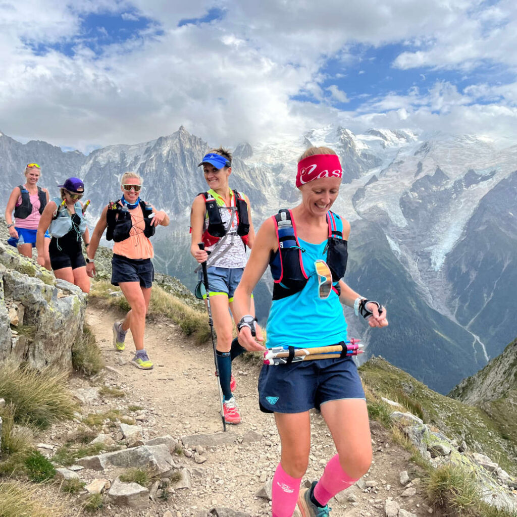 Women participating in a trail running race in the breathtaking French Alps.