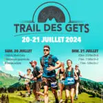 Runners participating in the Trail des Gets trail running race in Les Gets in July, with scenic alpine views