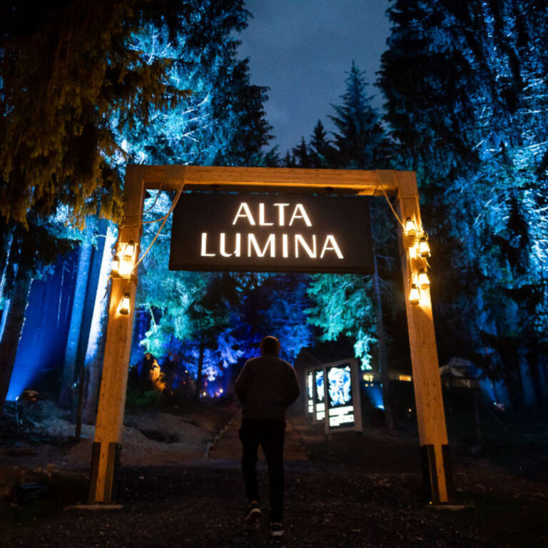 Alta Lumina attraction in Les Gets, illuminated with enchanting lights in winter.