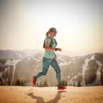 Trail Blanc trail running event in Les Gets, runners on snowy mountain paths.