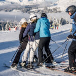 Group of skiers learning together on the slopes of Les Gets.